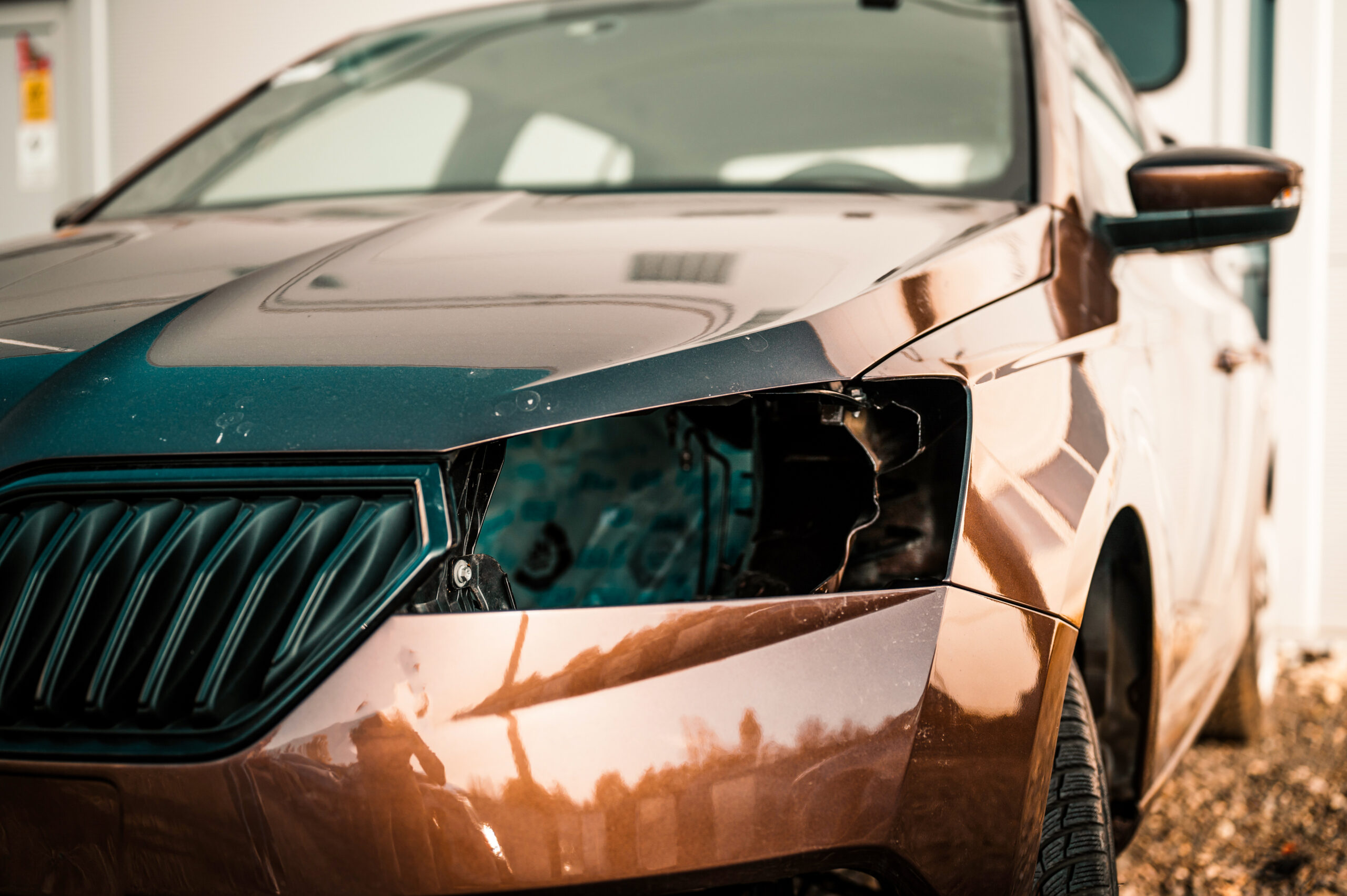 car-crash-accident-front-fender-light-damage-scratchs-bumper-broken-vehicle-detail-repair-car-service-automobile-industry