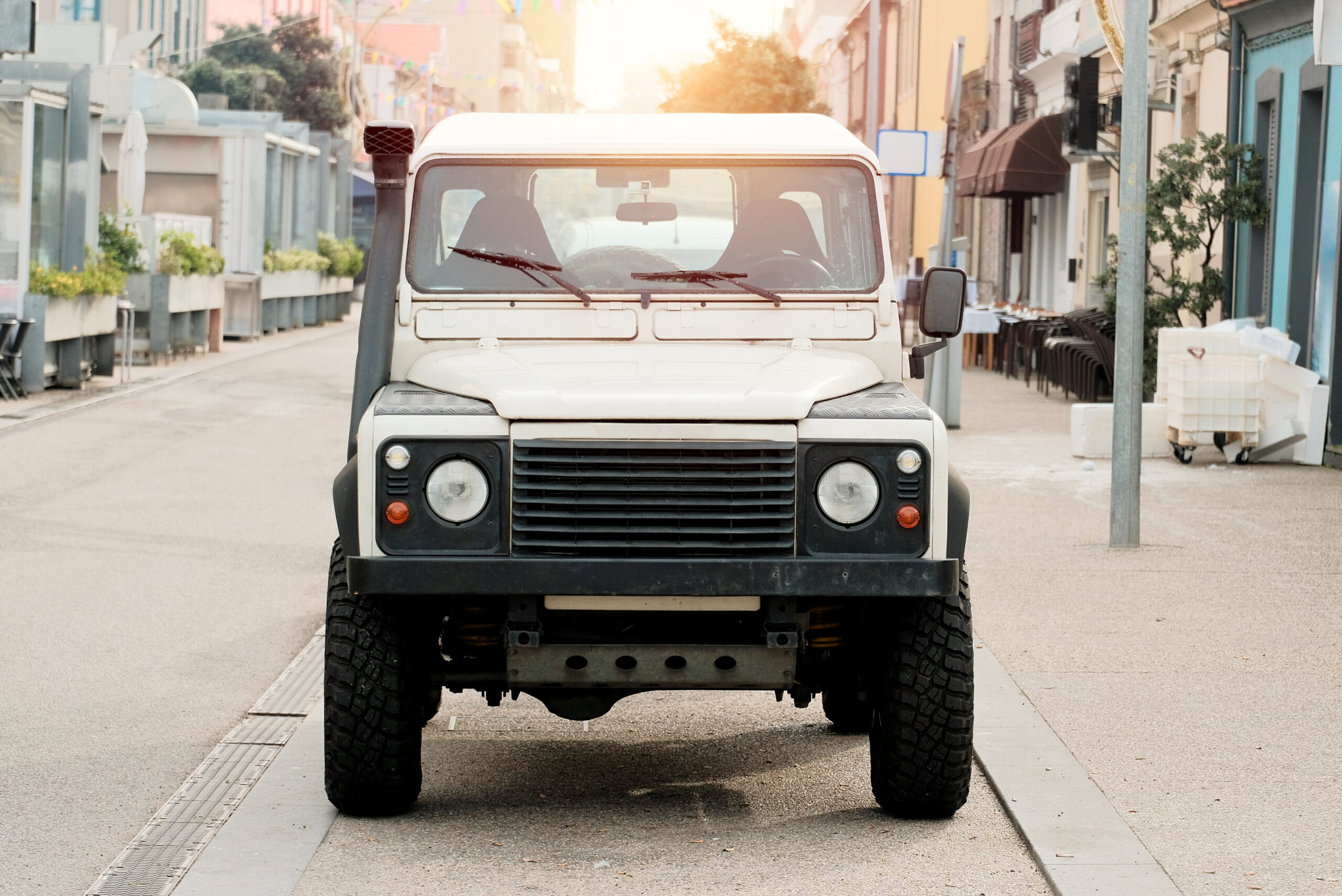 Classic Vintage Off-Road Vehicle Parked on a Quaint Urban Street